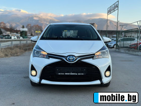     Toyota Yaris 1.5-hybrid-AUTOMAT-NAVI-KAMERA-KEYLES-EURO-6B-NEW