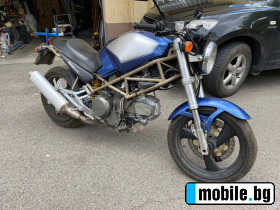     Ducati Monster 600 ~3 100 .
