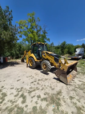 Багер Cat 428F