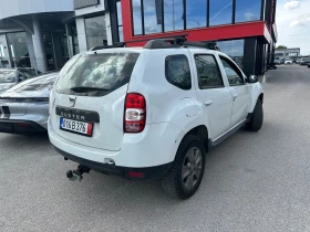 Dacia Duster 1.6 i 105kc./GPL/НАВИ/Камера/Теглич/Обслуж./ГАРАНЦ | Auto.bg — изображение 4 Dacia Duster 1.6 i 105kc./GPL/НАВИ/Камера/Теглич/Обслуж./ГАРАНЦ | Auto.bg — изображение 4