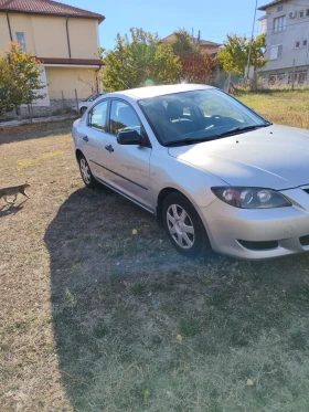 Mazda 3 1.6i - 1570 € - 31082223 12 | Car24.bg Mazda 3 1.6i - 1570 € - 31082223 12