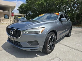 Volvo XC60 T5 MOMENTUM* Подгрев* М.точка* Следене* Пано* Авто - Car24.bg Volvo XC60 T5 MOMENTUM* Подгрев* М.точка* Следене* Пано* Авто