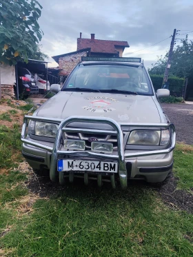 Kia Sportage 2.0 16V 128к.с. LPG | Auto.bg — изображение 3 Kia Sportage 2.0 16V 128к.с. LPG | Auto.bg — изображение 3