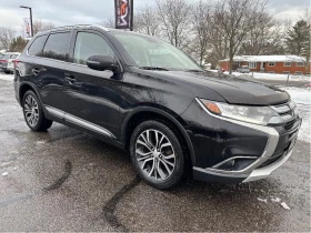 Mitsubishi Outlander ES S-AWC* ПОДГРЕВ* КОЖА* КАМЕРА* ШИБИДАХ* 6+ 1 - Car24.bg Mitsubishi Outlander ES S-AWC* ПОДГРЕВ* КОЖА* КАМЕРА* ШИБИДАХ* 6+ 1