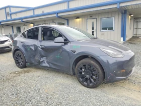 Tesla Model Y Long Range Dual Motor AWD/CARFAX | Auto.bg — изображение 4 Tesla Model Y Long Range Dual Motor AWD/CARFAX | Auto.bg — изображение 4