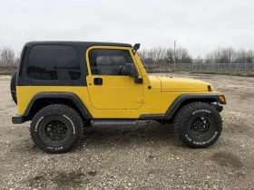 Jeep Wrangler 4.0 SPORT - 9900 € / 19362.72 лв. - 41277908 4 | Car24.bg Jeep Wrangler 4.0 SPORT - 9900 € / 19362.72 лв. - 41277908 4