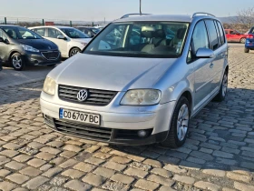 VW Touran 2.0TDI 140кс АВТОМАТИК ВСИЧКО ПЛАТЕНО - Car24.bg VW Touran 2.0TDI 140кс АВТОМАТИК ВСИЧКО ПЛАТЕНО