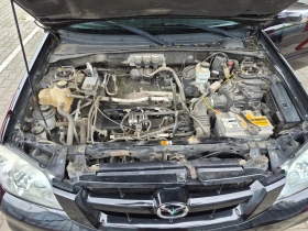 Mazda Tribute undefined | Auto.bg — изображение 8 Mazda Tribute undefined | Auto.bg — изображение 8