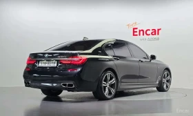 BMW 760 Li xDrive M Sport/МАСАЖИ/ОБДУХ/360/ХЕДЪП//ТВ/ДИСТР | Auto.bg — изображение 2 BMW 760 Li xDrive M Sport/МАСАЖИ/ОБДУХ/360/ХЕДЪП//ТВ/ДИСТР | Auto.bg — изображение 2