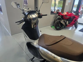 Piaggio Beverly 300ie, 2011г. | Auto.bg — изображение 10 Piaggio Beverly 300ie, 2011г. | Auto.bg — изображение 10