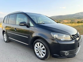 VW Touran 2.0 TDI / DSG / 6+ 1 / HIGHLINE / NAVI / PARKTRONI - Car24.bg VW Touran 2.0 TDI / DSG / 6+ 1 / HIGHLINE / NAVI / PARKTRONI