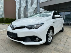 Обява за продажба на Toyota Auris HYBRID-DISTONIC-LANE-ASIST-NAVI-КАМЕРА-BRAKE-ASIST ~29 990 лв. - изображение 1