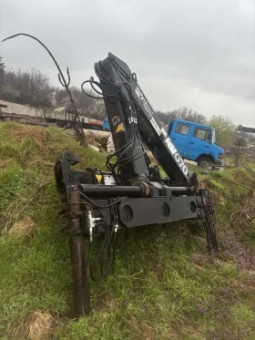 Автокран Хуан 070