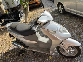 Honda Dylan 125кубика.