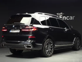 BMW X7 40d xDrive M/ PANO/ AMBIENT/ HARMAN/ МАСАЖ/ 7МЕСТА | Auto.bg — изображение 2 BMW X7 40d xDrive M/ PANO/ AMBIENT/ HARMAN/ МАСАЖ/ 7МЕСТА | Auto.bg — изображение 2