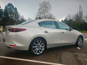 Mazda 3 2.0 Skyactiv-G/150 кс/фабрична гаранция - 21200 € / 41463.60 лв. - 43373912 5 | Car24.bg Mazda 3 2.0 Skyactiv-G/150 кс/фабрична гаранция - 21200 € / 41463.60 лв. - 43373912 5