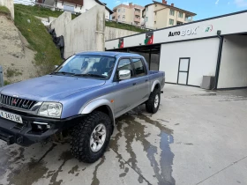 Mitsubishi L200 Газ - 6600 € / 12908.48 лв. - 32716306 9 | Car24.bg Mitsubishi L200 Газ - 6600 € / 12908.48 лв. - 32716306 9