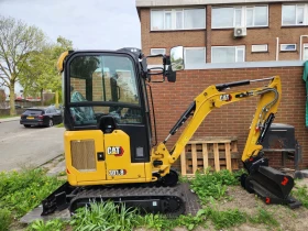 Багер Cat 301.8