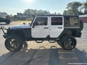 Jeep Wrangler Unlimited Sahara - 15000 € / 29337.45 лв. - 54505203 5 | Car24.bg Jeep Wrangler Unlimited Sahara - 15000 € / 29337.45 лв. - 54505203 5