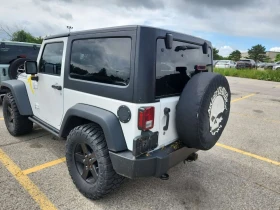 Jeep Wrangler * 4wd 2dr Sport * CARFAX * БЕЗ ПЪРВОНАЧАЛНА ВНОСКА | Auto.bg — изображение 6 Jeep Wrangler * 4wd 2dr Sport * CARFAX * БЕЗ ПЪРВОНАЧАЛНА ВНОСКА | Auto.bg — изображение 6