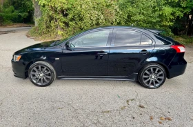 Mitsubishi Lancer 1.8i Sportback Lux Швейцария | Auto.bg — изображение 8 Mitsubishi Lancer 1.8i Sportback Lux Швейцария | Auto.bg — изображение 8