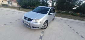 VW Touran ПЕРФЕКТЕН - Car24.bg VW Touran ПЕРФЕКТЕН