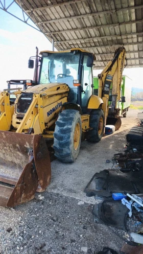 Багер Komatsu 93S