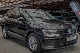 VW Tiguan 2.0TDI/DSG/PDC/75000KM/Lane Assist | Auto.bg — изображение 2 VW Tiguan 2.0TDI/DSG/PDC/75000KM/Lane Assist | Auto.bg — изображение 2