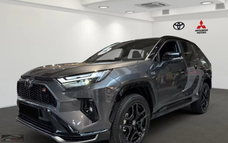 Toyota Rav4 2.5 PHEV/GR/306HP/4X4/HUD/360/NAVI/255h - 54299 € / 106199.61 лв. - 82983523 1 | Car24.bg Toyota Rav4 2.5 PHEV/GR/306HP/4X4/HUD/360/NAVI/255h - 54299 € / 106199.61 лв. - 82983523 1