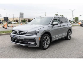 VW Tiguan R-LINE/PANODIGITAL DASH/KEYLESS/ФИНАНСИРАНЕ - Car24.bg VW Tiguan R-LINE/PANODIGITAL DASH/KEYLESS/ФИНАНСИРАНЕ