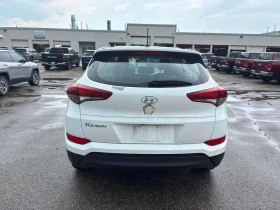 Hyundai Tucson * FWD 4dr 2.0L * CARFAX * БЕЗ ПЪРВОНАЧАЛНА ВНОСКА | Auto.bg — изображение 4 Hyundai Tucson * FWD 4dr 2.0L * CARFAX * БЕЗ ПЪРВОНАЧАЛНА ВНОСКА | Auto.bg — изображение 4
