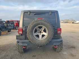 Jeep Wrangler UNLIMITED RUBICON / РЪЧКА / КОЖЕН САЛОН - 15500 € / 30315.36 лв. - 99788314 5 | Car24.bg Jeep Wrangler UNLIMITED RUBICON / РЪЧКА / КОЖЕН САЛОН - 15500 € / 30315.36 лв. - 99788314 5