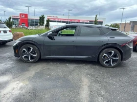 Kia EV6 * Land w/GT Line Pkg AWD * CARFAX * БЕЗ ПЪРВОНАЧАЛ | Auto.bg — изображение 2 Kia EV6 * Land w/GT Line Pkg AWD * CARFAX * БЕЗ ПЪРВОНАЧАЛ | Auto.bg — изображение 2