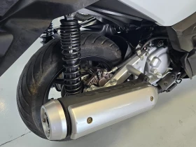 Yamaha X-max 250ie, Facelift, 2014г. | Auto.bg — изображение 11 Yamaha X-max 250ie, Facelift, 2014г. | Auto.bg — изображение 11