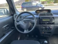 Daihatsu Materia 4WD 1.5I 103кс  - [13] 