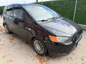 Mitsubishi Colt 1.3i-95к.с | Mobile.bg — малка снимка 5