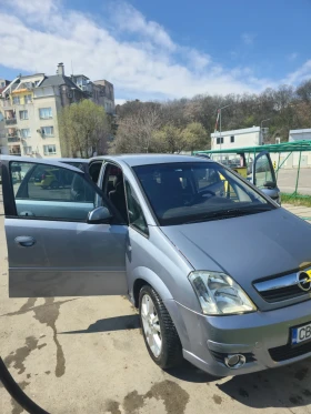 Opel Meriva 1.6 автомат бензин + газ - 2700 € / 5280.74 лв. - 49489424 11 | Car24.bg Opel Meriva 1.6 автомат бензин + газ - 2700 € / 5280.74 лв. - 49489424 11