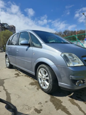 Opel Meriva 1.6 автомат бензин + газ - 2700 € / 5280.74 лв. - 49489424 4 | Car24.bg Opel Meriva 1.6 автомат бензин + газ - 2700 € / 5280.74 лв. - 49489424 4