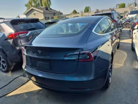 Tesla Model 3 * Standard Range Plus * CARFAX * БЕЗ ПЪРВОНАЧАЛНА | Auto.bg — изображение 4 Tesla Model 3 * Standard Range Plus * CARFAX * БЕЗ ПЪРВОНАЧАЛНА | Auto.bg — изображение 4
