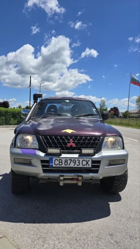 Mitsubishi L200 Повдигнат с 20см, либетка, външен въздоховот, тегл | Auto.bg — изображение 13 Mitsubishi L200 Повдигнат с 20см, либетка, външен въздоховот, тегл | Auto.bg — изображение 13