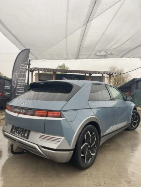 Hyundai Ioniq 5 72.6KWh/UNIQ/ГАРАНЦИЯ/360/HEADUP/BOSE/PANO/30THUNI - 29498 € - 60706392 4 | Car24.bg Hyundai Ioniq 5 72.6KWh/UNIQ/ГАРАНЦИЯ/360/HEADUP/BOSE/PANO/30THUNI - 29498 € - 60706392 4