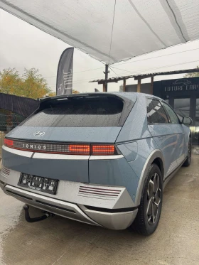 Hyundai Ioniq 5 72.6KWh/UNIQ/ГАРАНЦИЯ/360/HEADUP/BOSE/PANO/30THUNI - 29498 € - 60706392 5 | Car24.bg Hyundai Ioniq 5 72.6KWh/UNIQ/ГАРАНЦИЯ/360/HEADUP/BOSE/PANO/30THUNI - 29498 € - 60706392 5