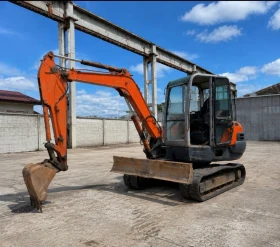 Багер Hitachi ZX50