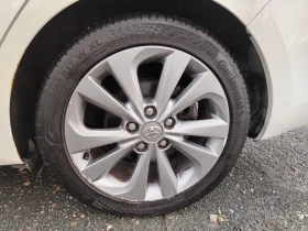 Toyota Auris 1.8-99 КС HYBRID, PANORAMA, KOJA, NAVI - 13999 лв. / 7157.58 € - 31928360 14 | Car24.bg Toyota Auris 1.8-99 КС HYBRID, PANORAMA, KOJA, NAVI - 13999 лв. / 7157.58 € - 31928360 14