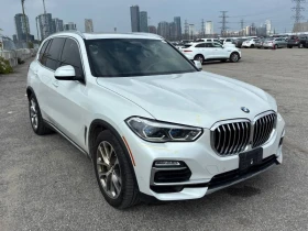 BMW X5 * xDrive40i * ЛАЗЕРИ * ДИСТРОНИК * ТЕЛЕВИЗОРИ * 36