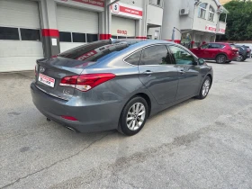 Hyundai I40 1.7 CRDi(141hp)Intuitive/Blue Drive/AT/Navi/Камерa | Auto.bg — изображение 5 Hyundai I40 1.7 CRDi(141hp)Intuitive/Blue Drive/AT/Navi/Камерa | Auto.bg — изображение 5