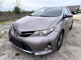 Обява за продажба на Toyota Auris HYBRID /NAVI/ КАМЕРА ЗА ЗАДЕН ХОД ~17 333 лв. - изображение 1