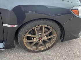 Subaru WRX STI/CARFAX/КОЖА/ШИБИДАХ/КЛИП | Auto.bg — изображение 7 Subaru WRX STI/CARFAX/КОЖА/ШИБИДАХ/КЛИП | Auto.bg — изображение 7