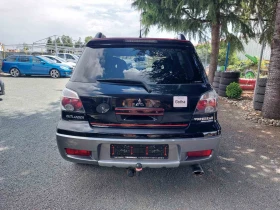 Mitsubishi Outlander 2.0i, 4x4 | Auto.bg — изображение 14 Mitsubishi Outlander 2.0i, 4x4 | Auto.bg — изображение 14