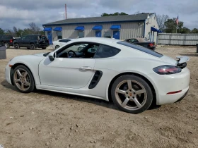 Porsche Cayman Кожа* Подгрев* Keyless* NAVI* CARFAX - 26366 € / 51567.41 лв. - 83569876 2 | Car24.bg Porsche Cayman Кожа* Подгрев* Keyless* NAVI* CARFAX - 26366 € / 51567.41 лв. - 83569876 2